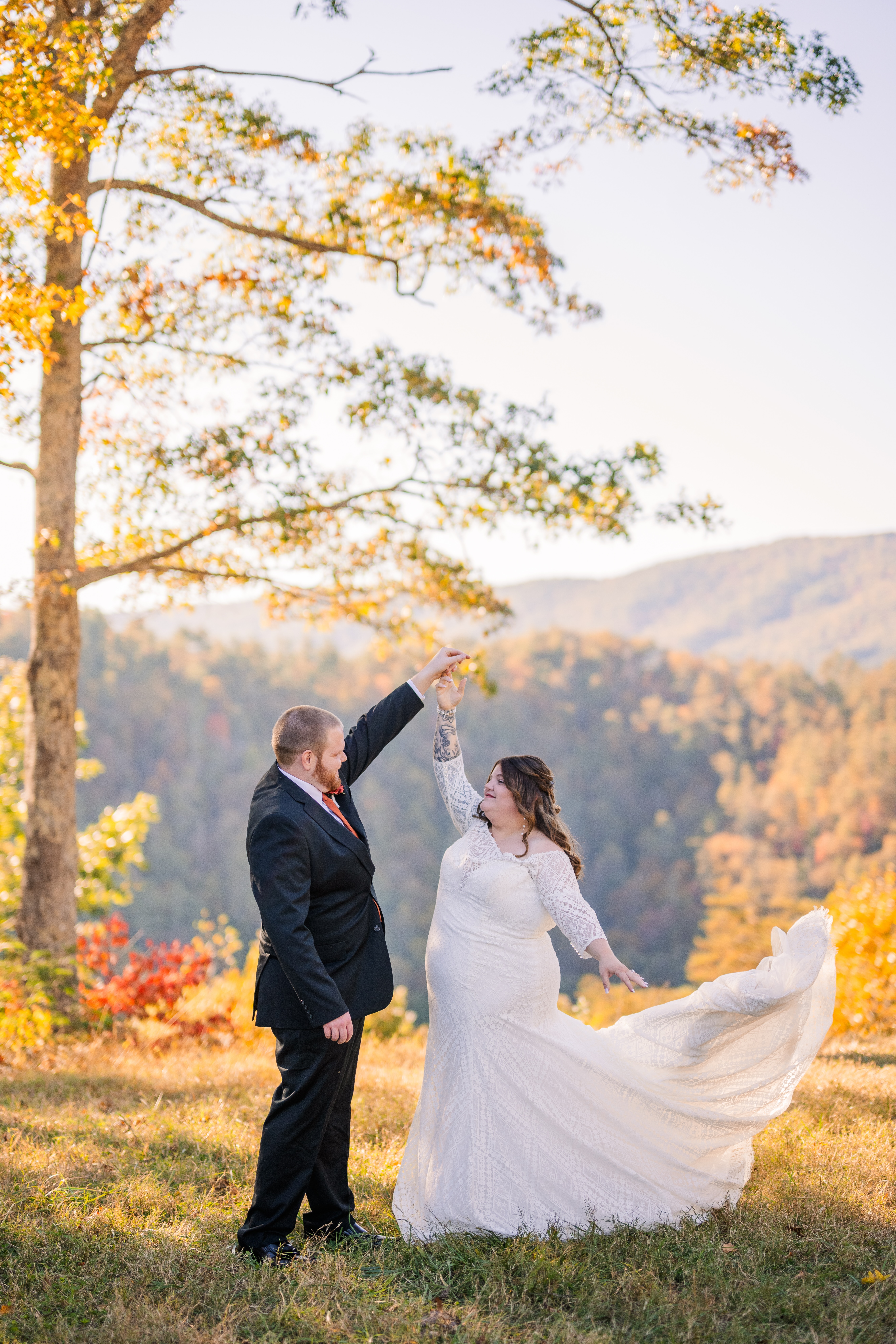 Bride and Groom dancing amongst the fall colors in the Smoky Mountains