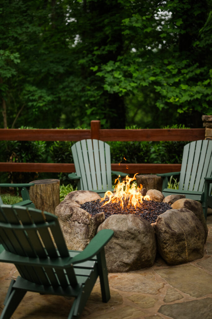 Fire blazing in the outdoor fire pit at The Greenbrier Restaurant in Gatlinburg, Tennessee, a popular Smoky Mountains dining spot.