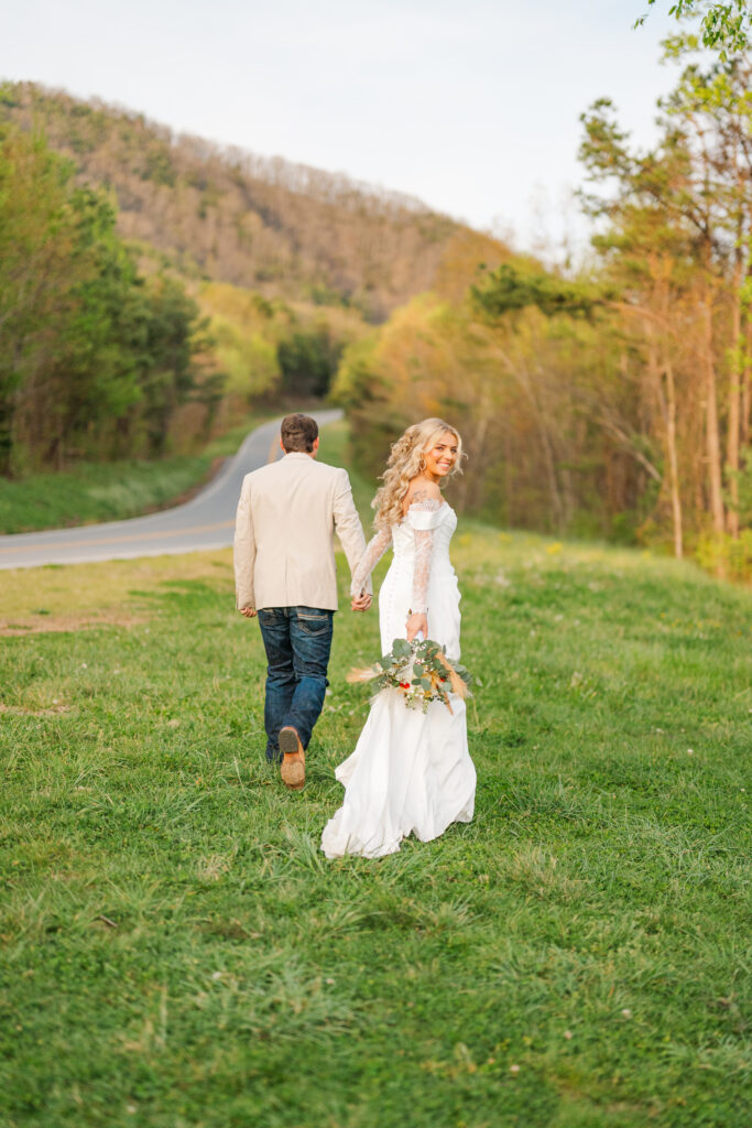a couple happily running off to elope in gatlinburg, tn
