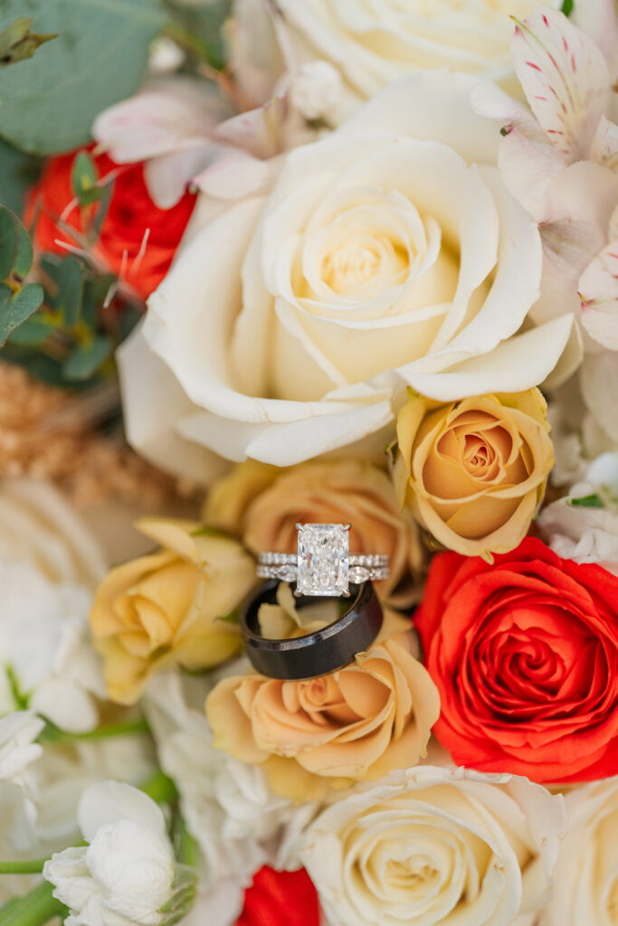 wedding rings on a bouquet of flowers